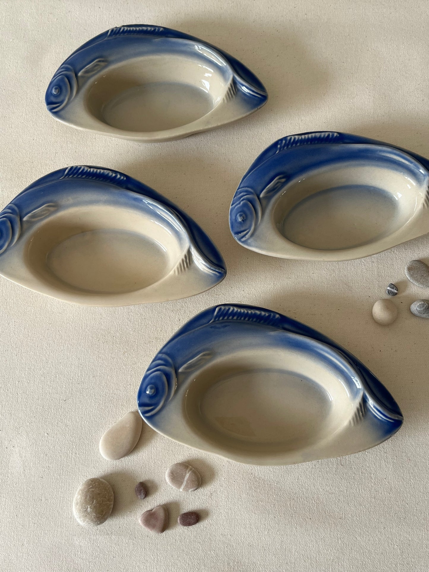 Set Of Four French Fish Dishes.