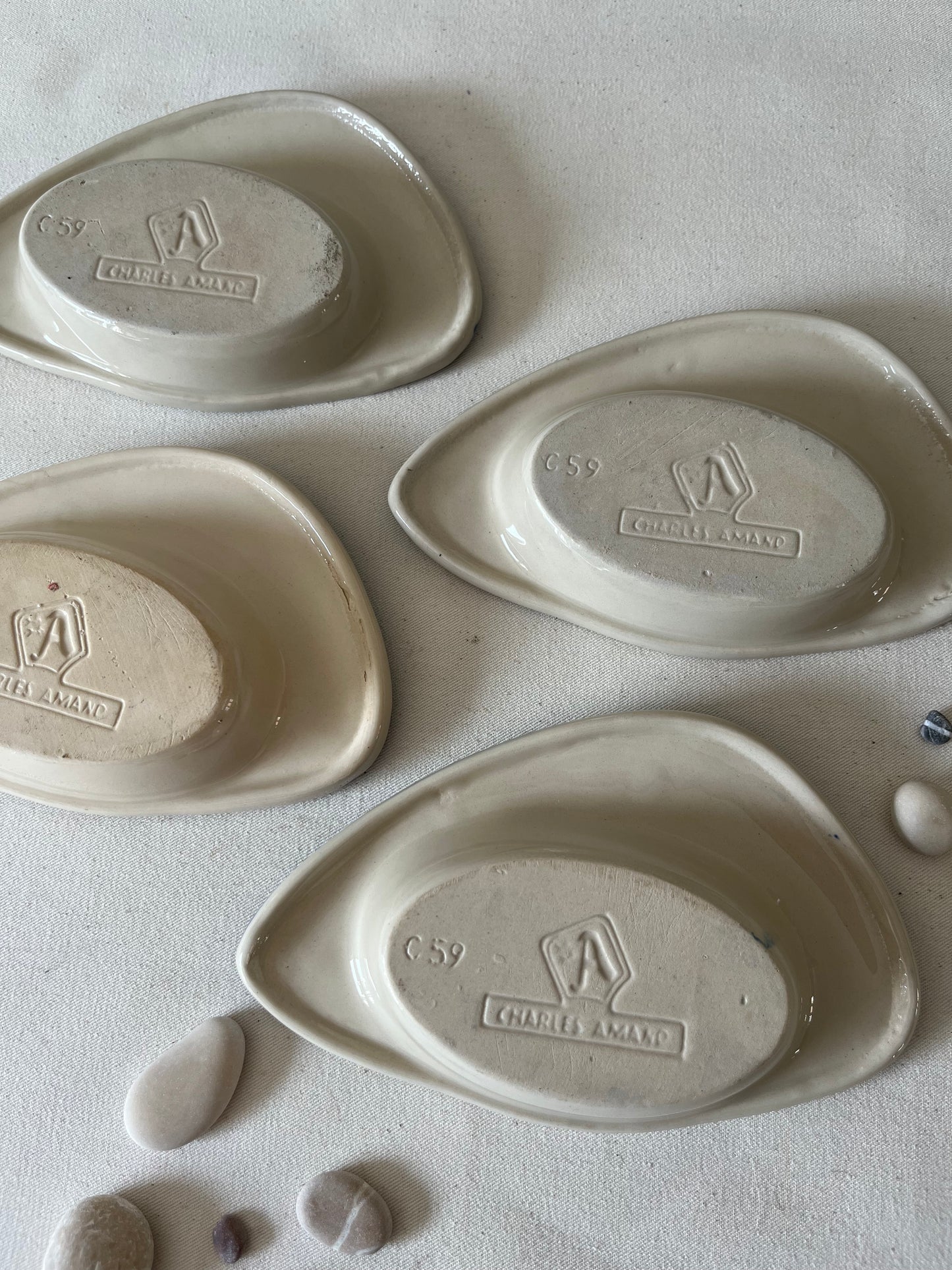 Set Of Four French Fish Dishes.