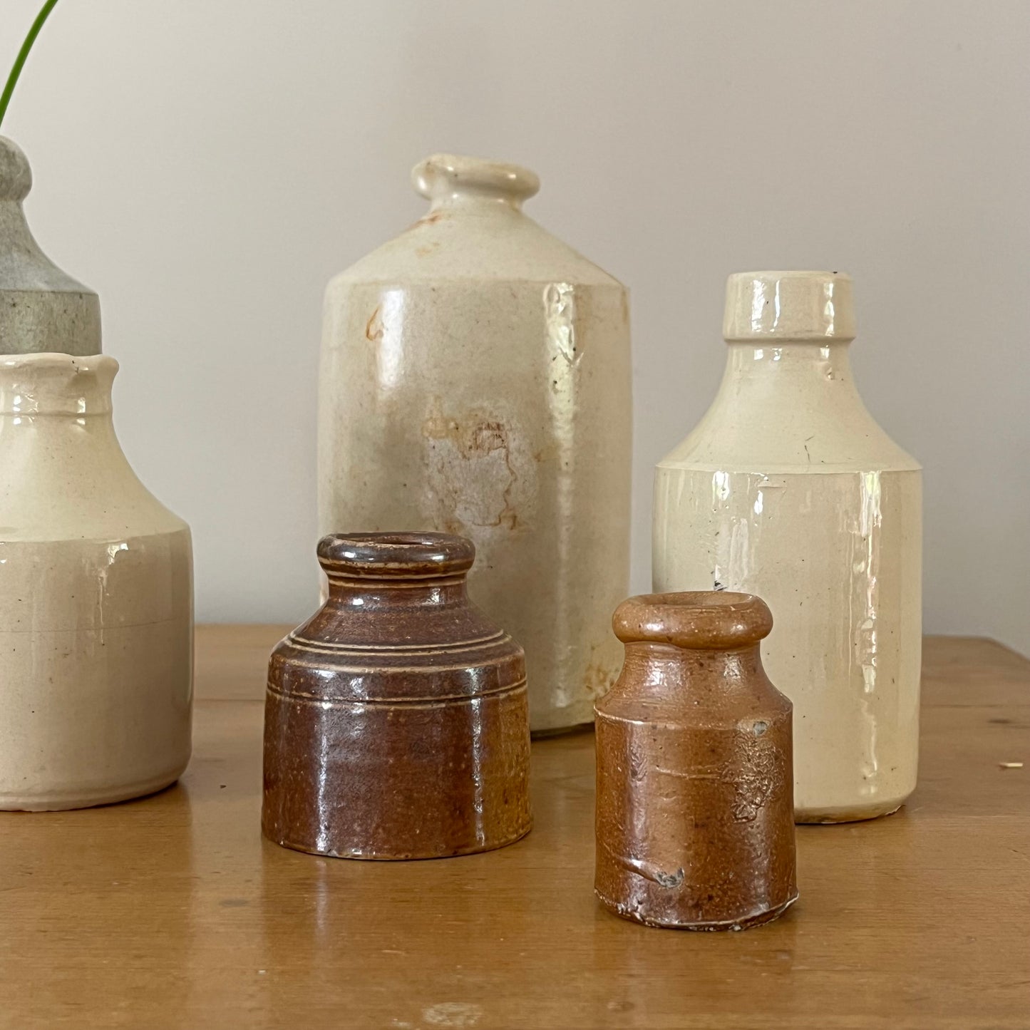 Set of Seven Stoneware Pots.