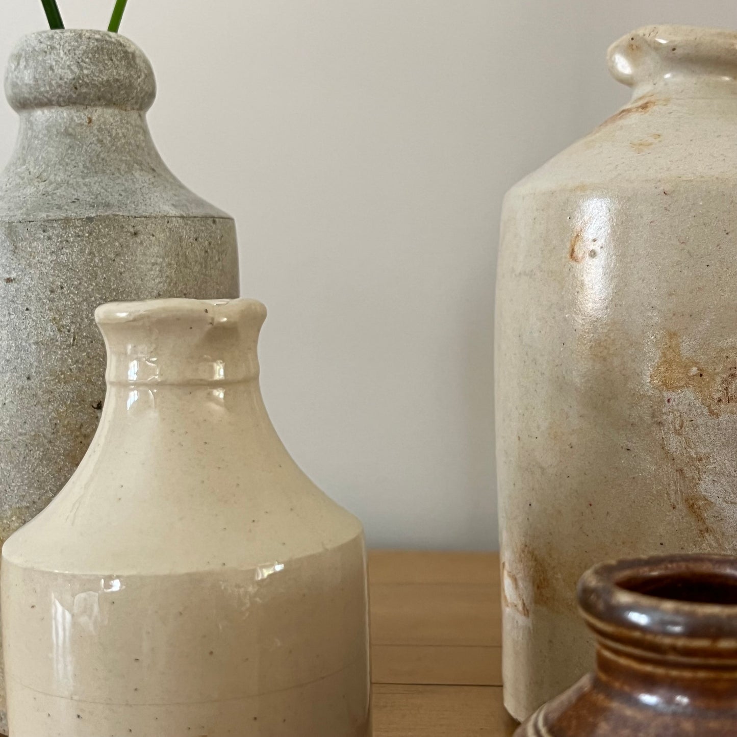 Set of Seven Stoneware Pots.