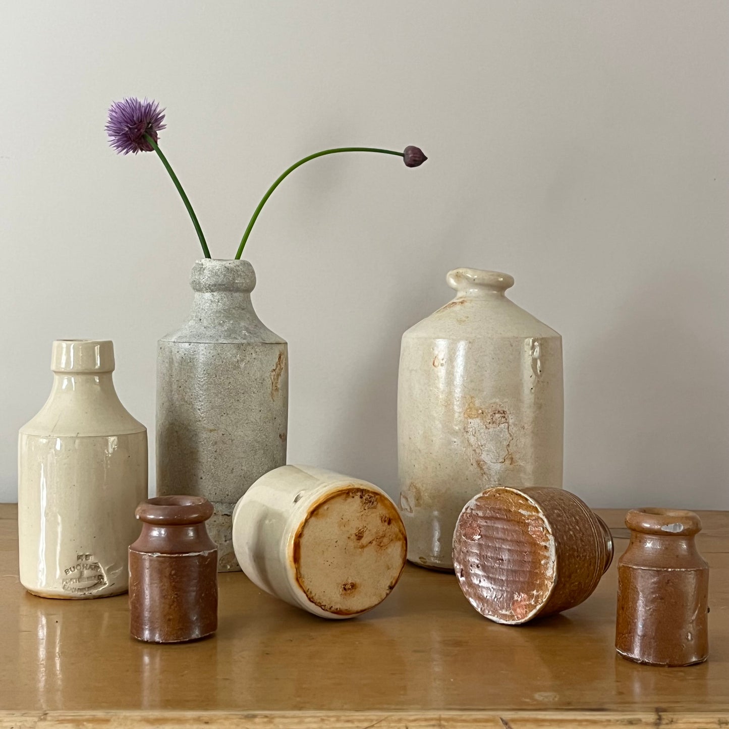 Set of Seven Stoneware Pots.