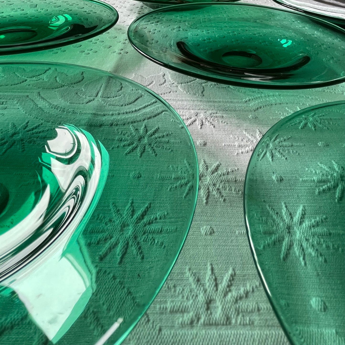 Set of Six Emerald Green Glass Plates.