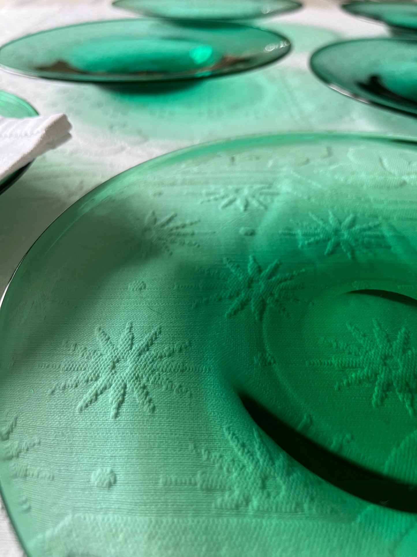 Set of Six Emerald Green Glass Plates.