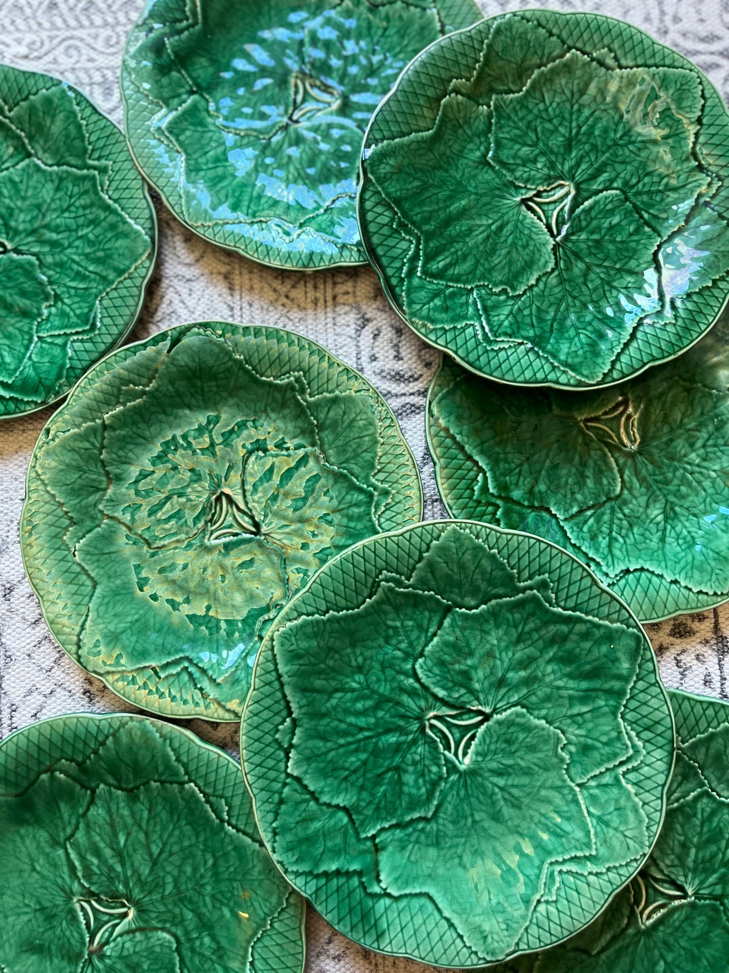 A Set of Eight French Majolica Plates.