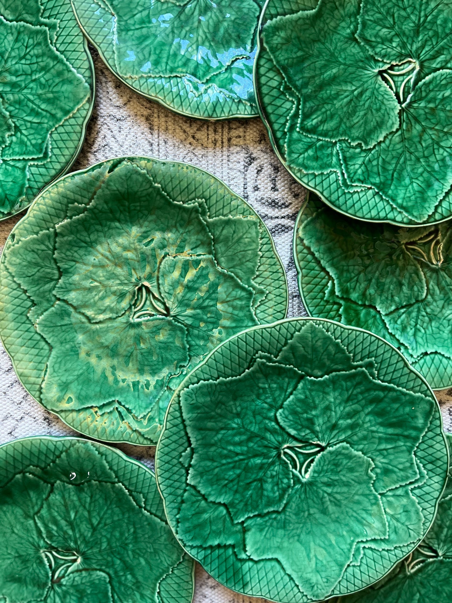 A Set of Eight French Majolica Plates.