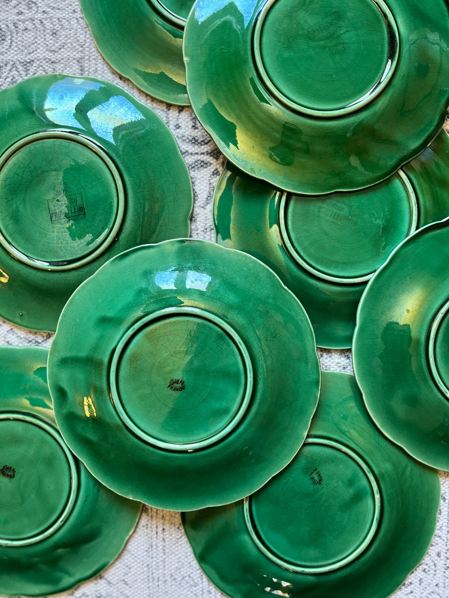 A Set of Eight French Majolica Plates.