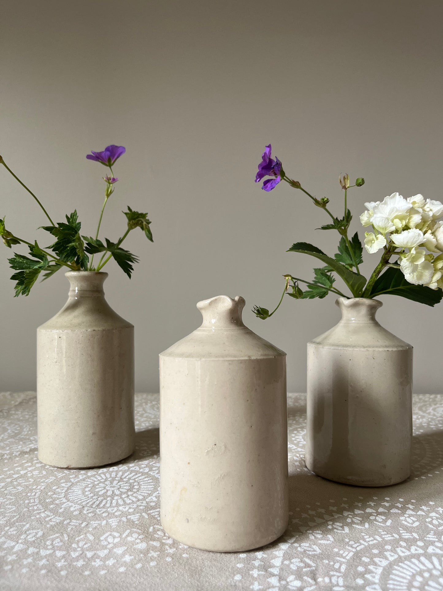 A set of Three Stoneware Pots.