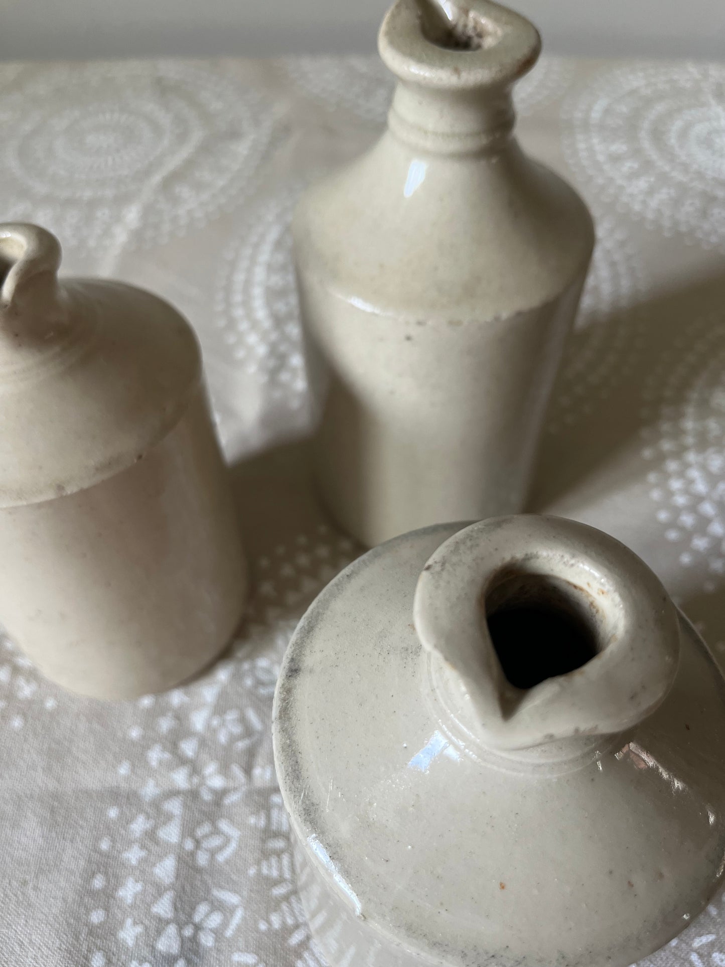 A set of Three Stoneware Pots.