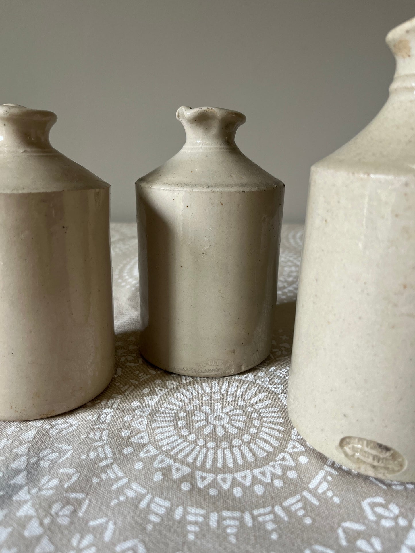 A set of Three Stoneware Pots.
