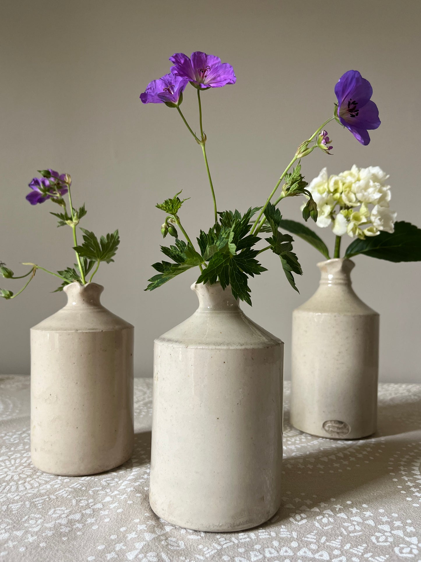 A set of Three Stoneware Pots.