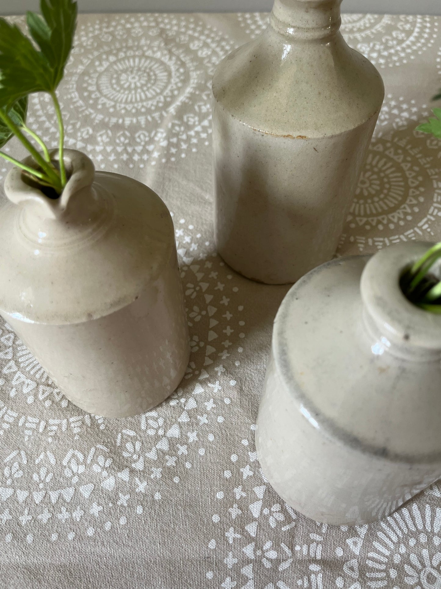 A set of Three Stoneware Pots.