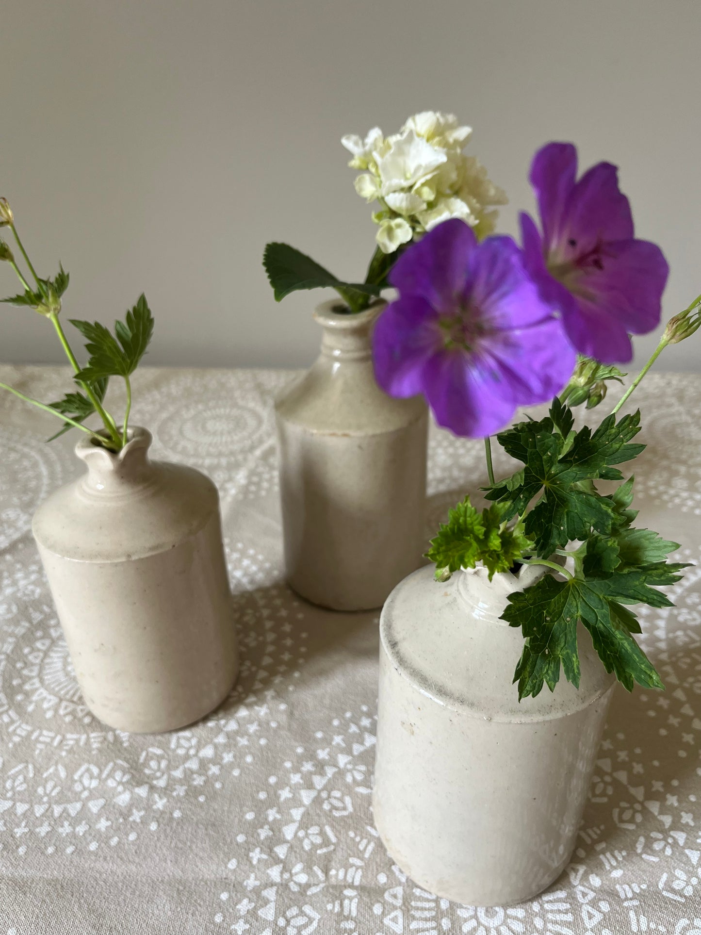 A set of Three Stoneware Pots.
