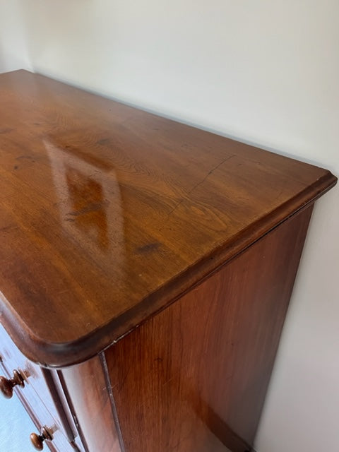 Walnut And Mahogany Chest of Drawers.