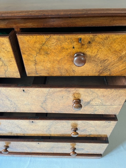 Walnut And Mahogany Chest of Drawers.