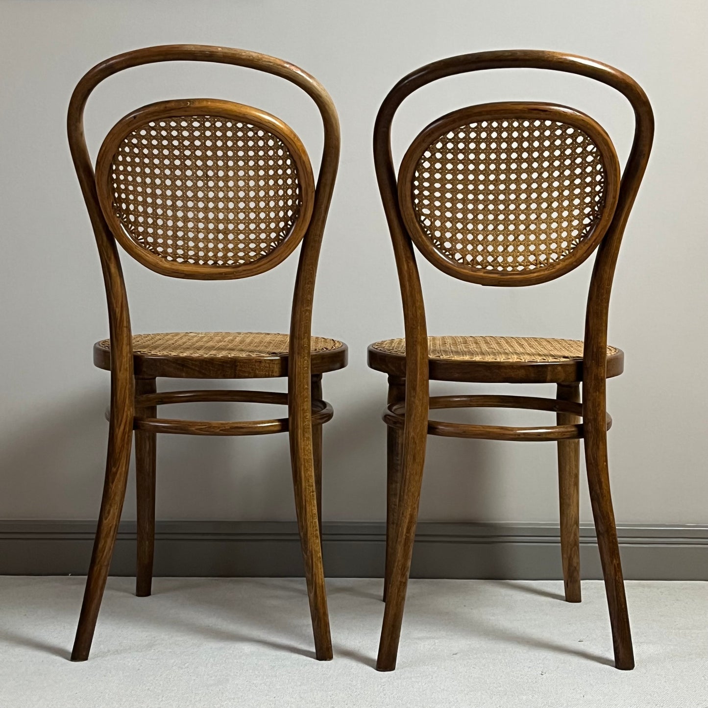 Stylish Pair Of Caned Bentwood Chairs.
