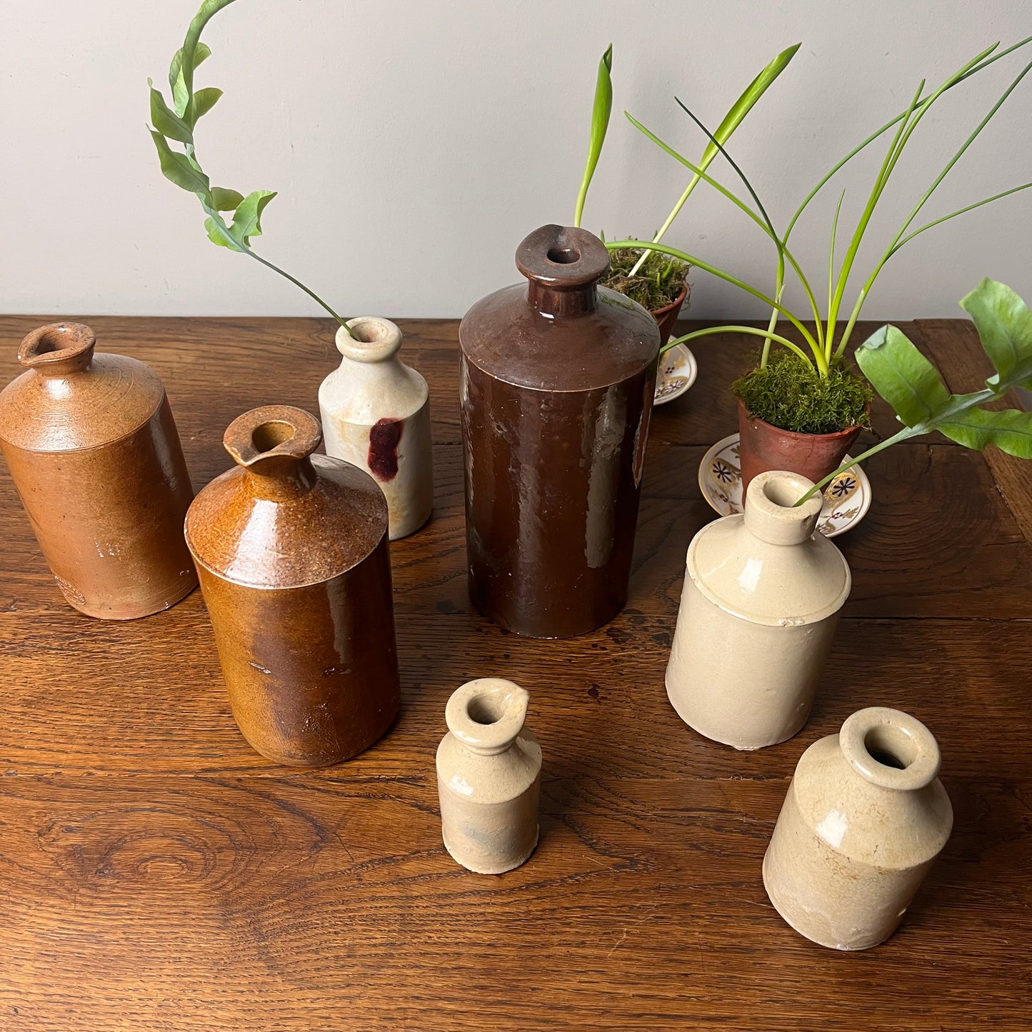 Set of Seven Stoneware Pots.
