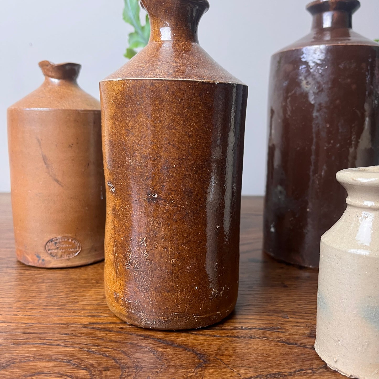 Set of Seven Stoneware Pots.