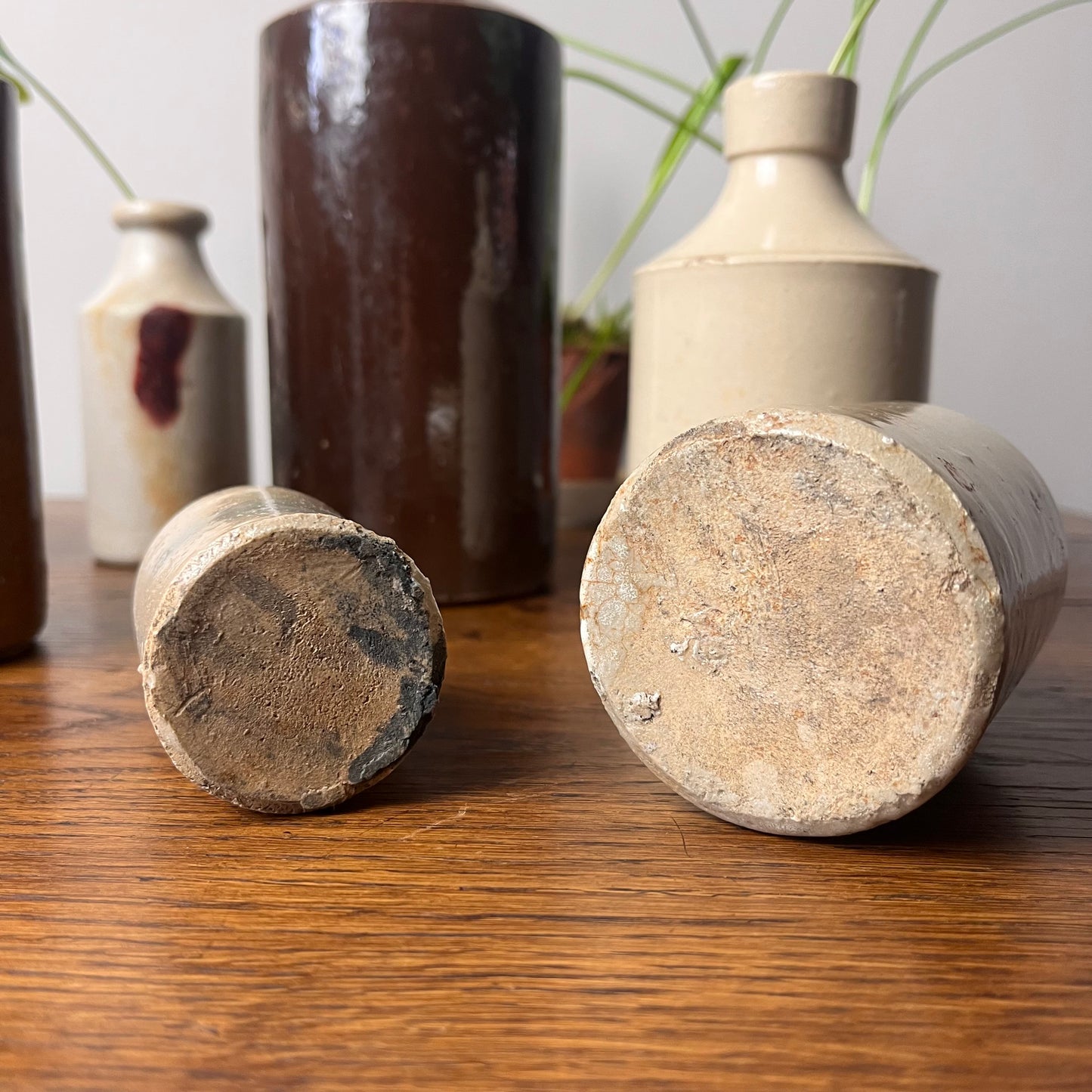 Set of Seven Stoneware Pots.