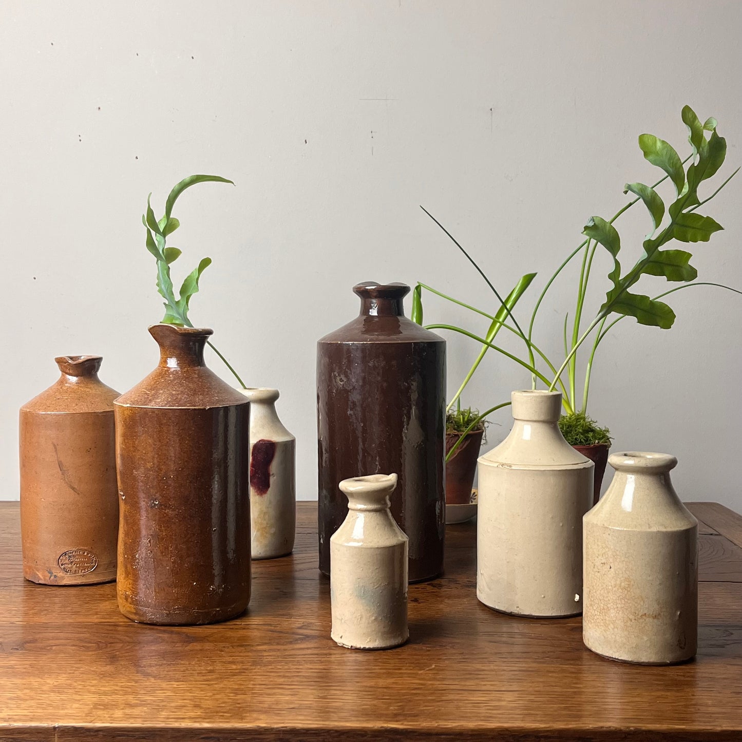 Set of Seven Stoneware Pots.