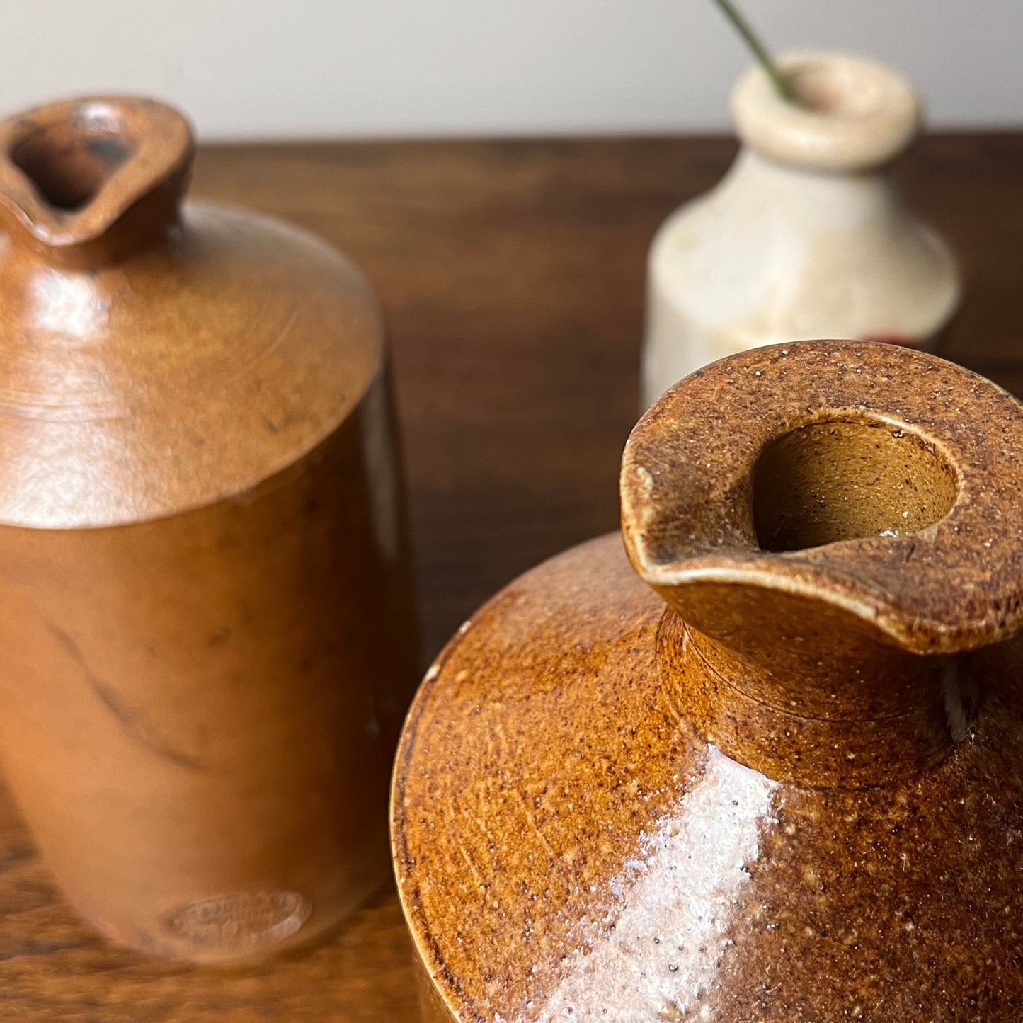 Set of Seven Stoneware Pots.