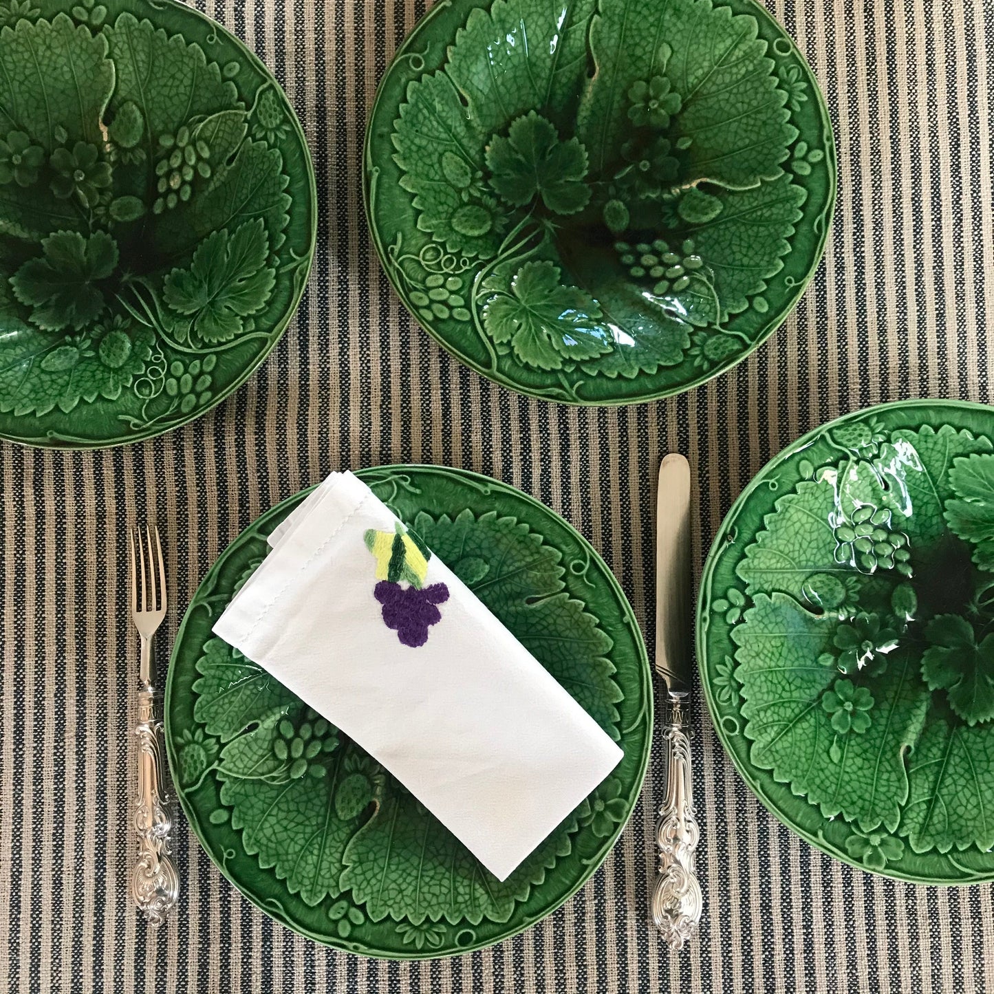 Set of Four Majolica Plates.