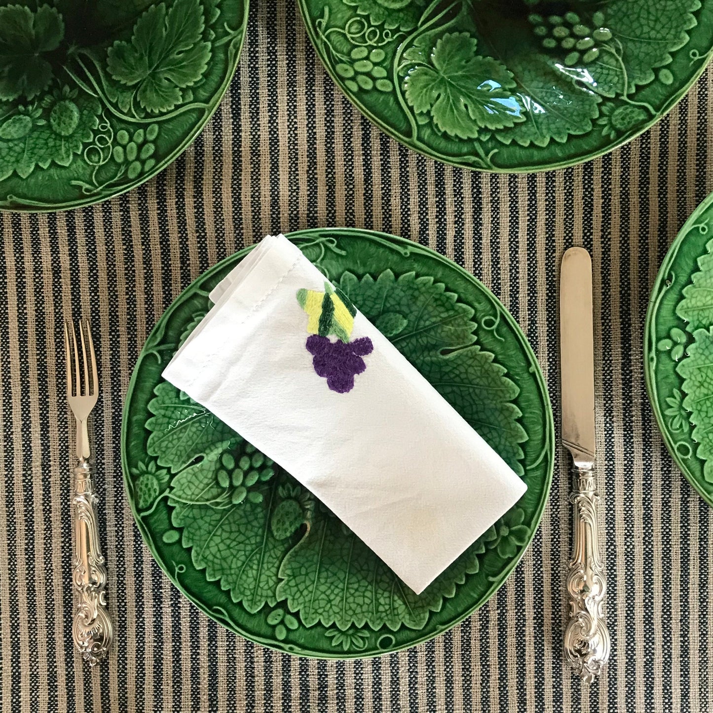 Set of Four Majolica Plates.