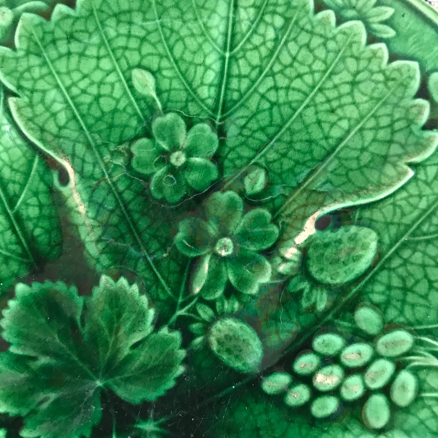 Set of Four Majolica Plates.
