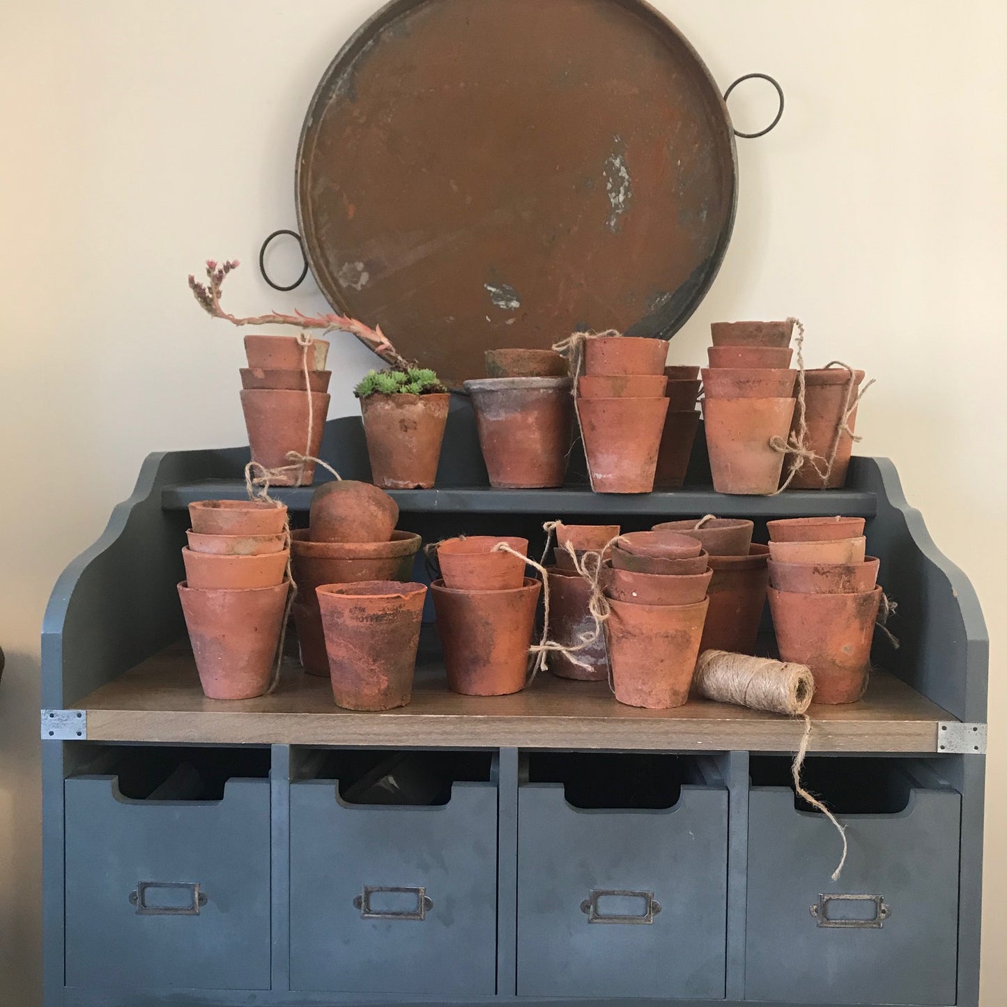 Set of Four Terracotta Pots.