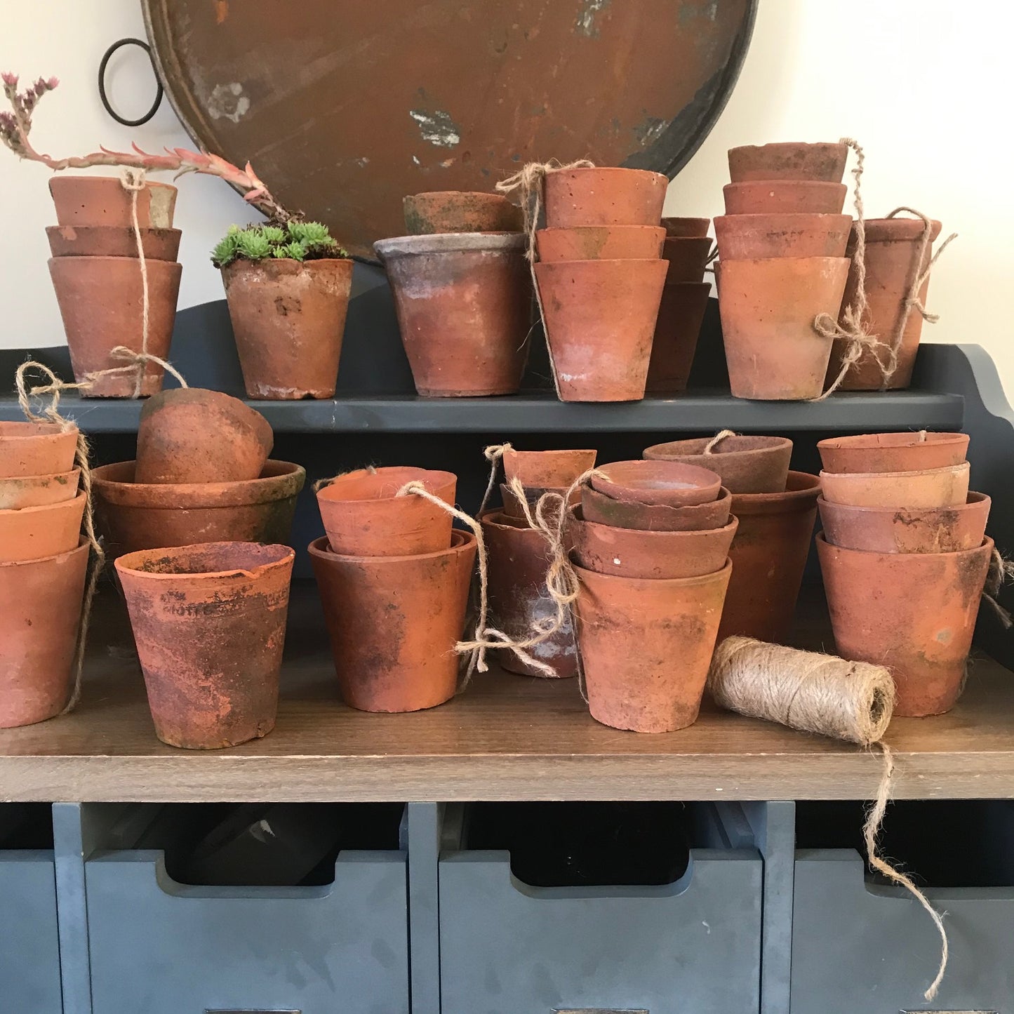 A Set of Four Terracotta Pots.