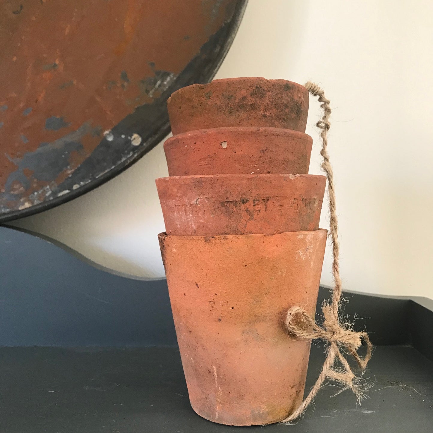 A Set of Four Terracotta Pots.