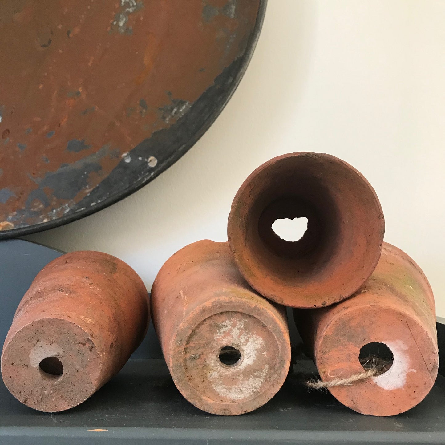 A Set of Four Terracotta Pots.