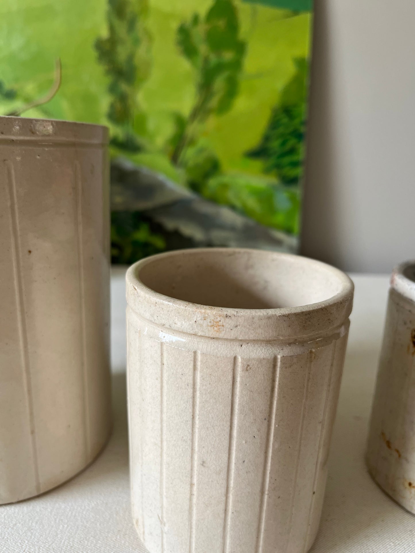 A Set of Three Stoneware Jam Pots.