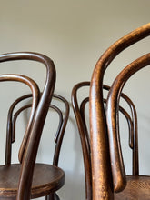 Load image into Gallery viewer, Set of Four Fischel Bentwood Chairs.
