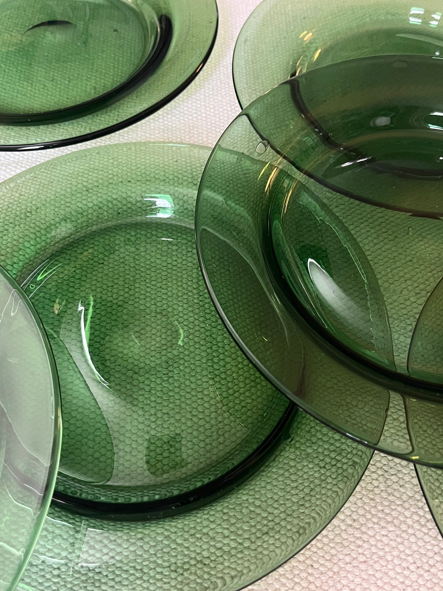 Set of Eight Green Glass Plates.