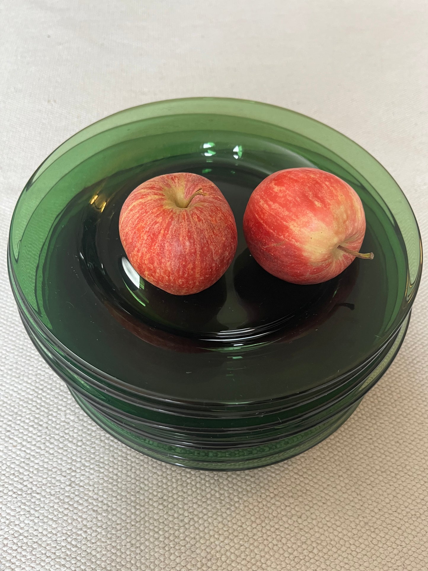 Set of Eight Green Glass Plates.