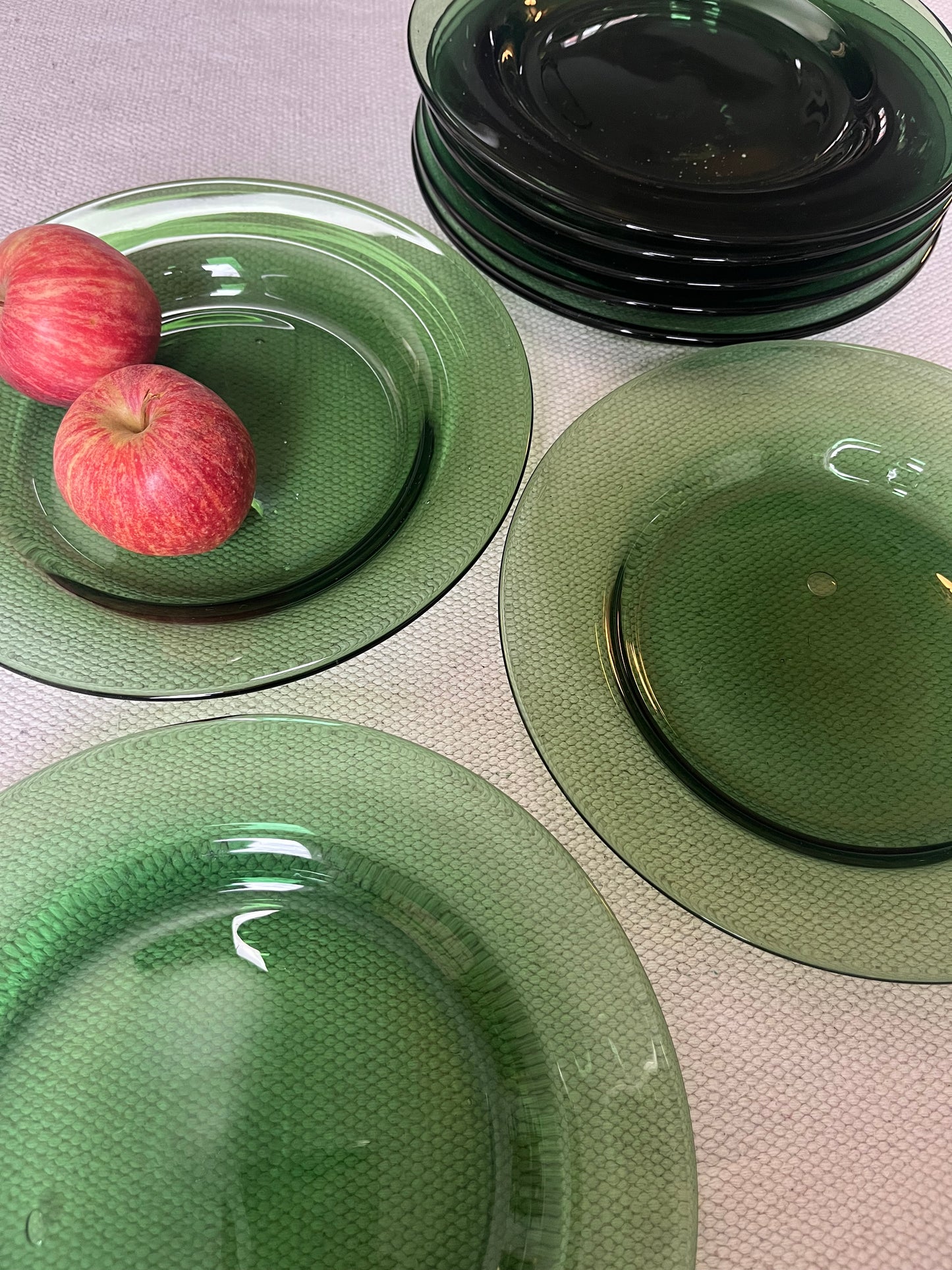 Set of Eight Green Glass Plates.