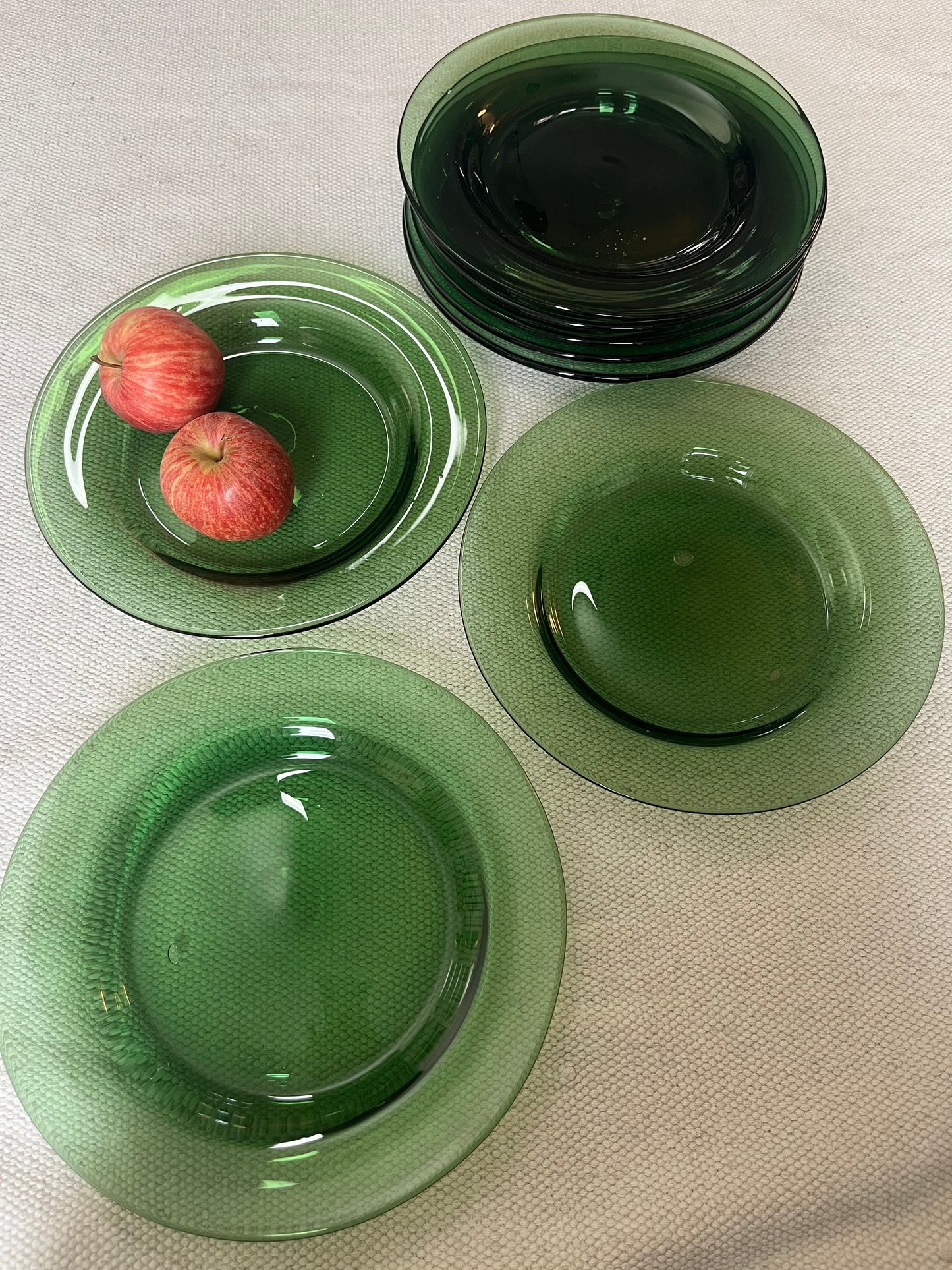 Set of Eight Green Glass Plates.