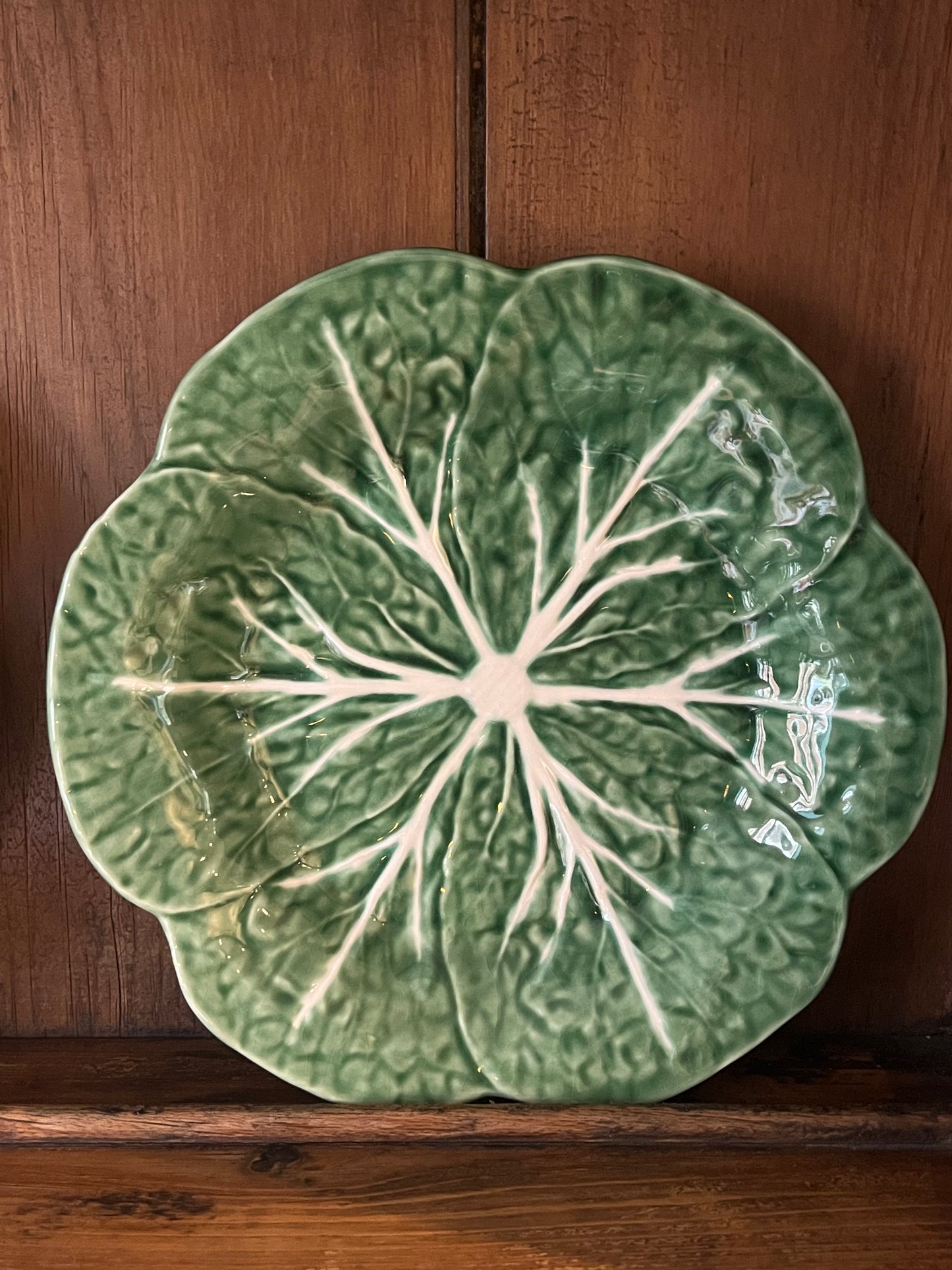 A Set Of Four Cabbage Plates.