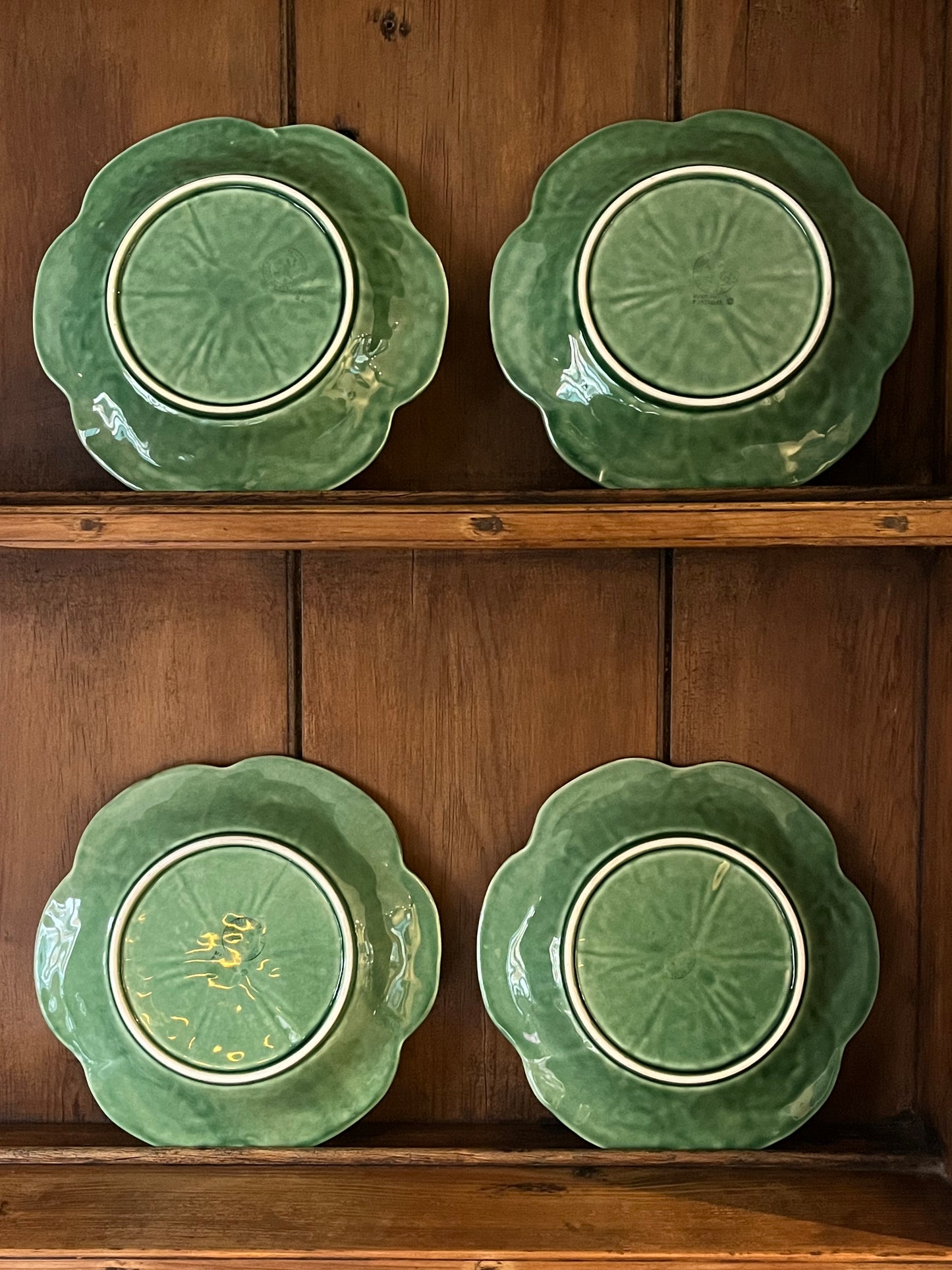 A Set Of Four Cabbage Plates.