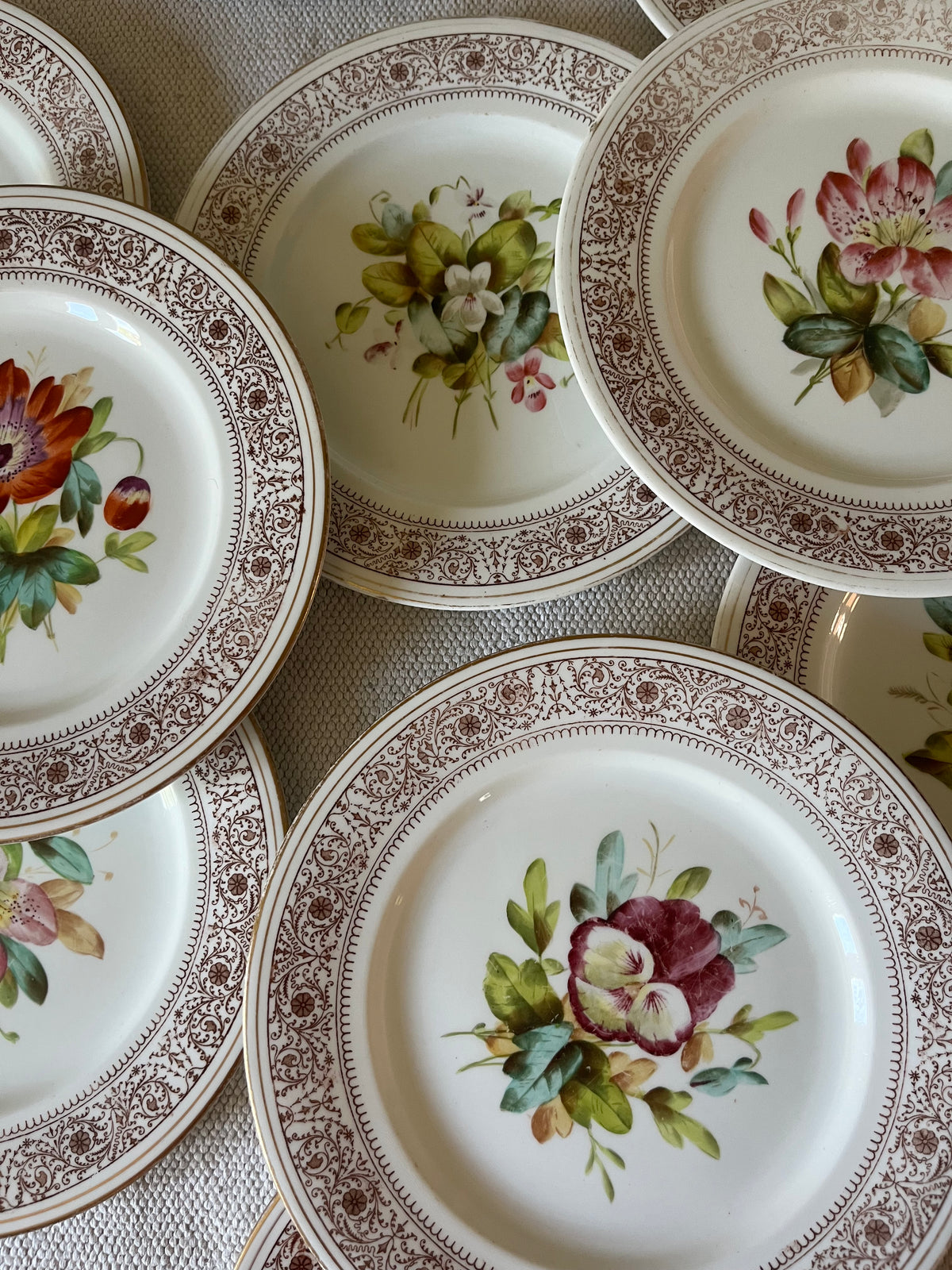 A Set of Ten Plates.