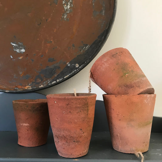 A Set of Four Terracotta Pots.