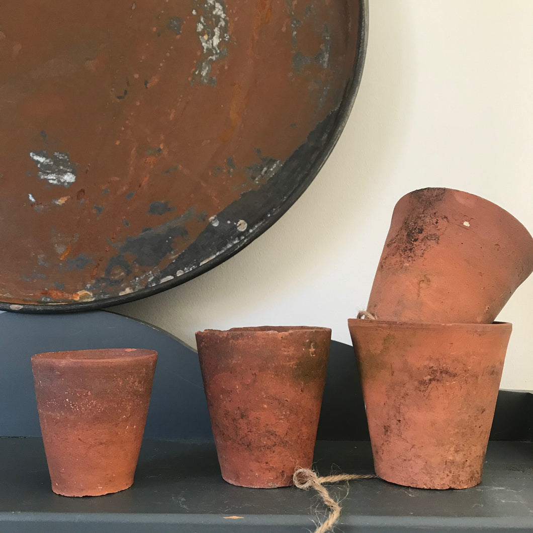Set of Four Old Terracotta Pots.