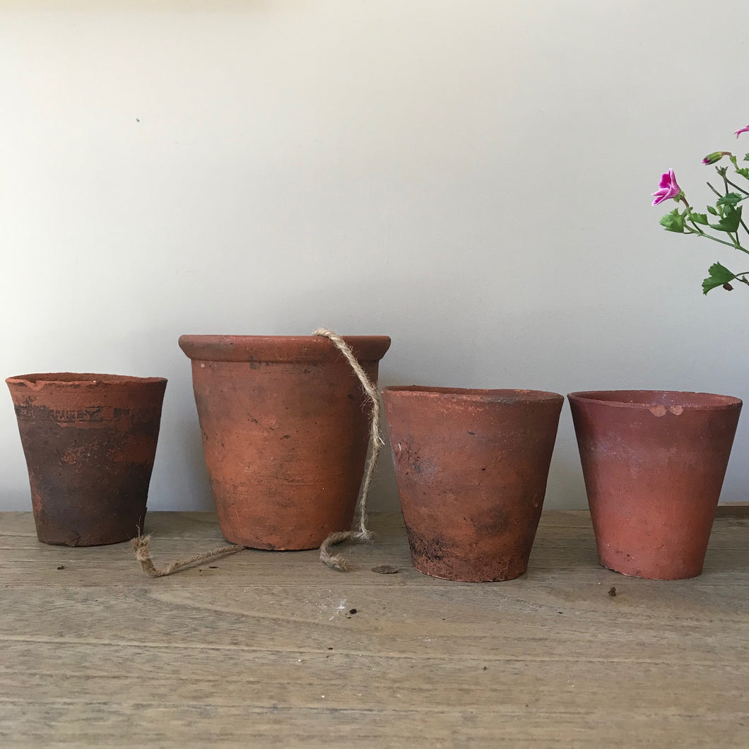 Set Of Four Early Terracotta Pots.